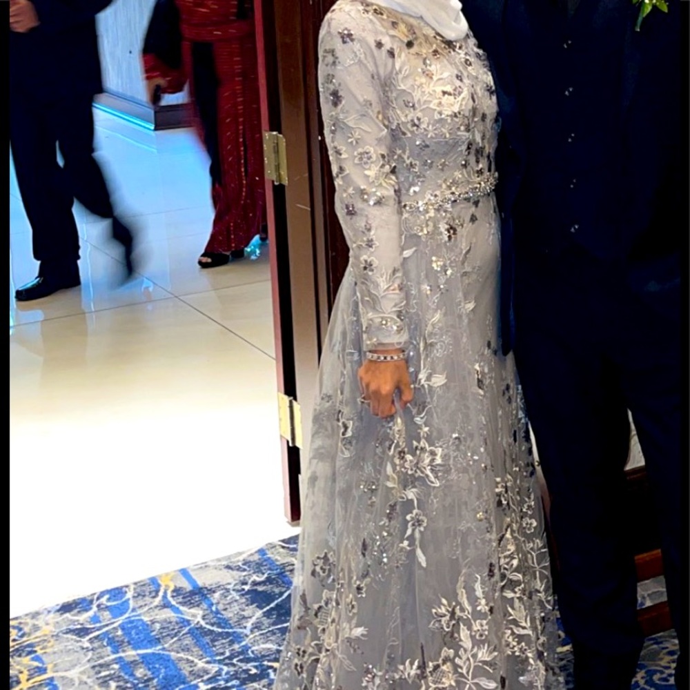 Fully lined dress with diamond belt and light weight over skirt